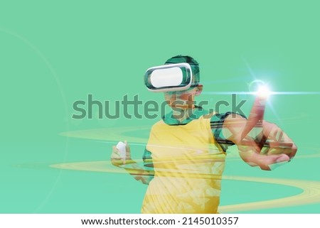boy using virtual reality simulator headset on green background