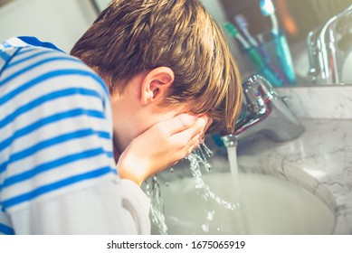 Boy Wash His Face In The Bathroom New Day Of Ordinary Life