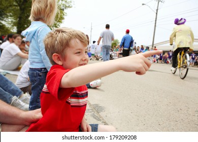 Boy Watching A Parade, 