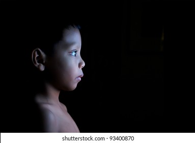 Boy Watching Static On Television In The Dark