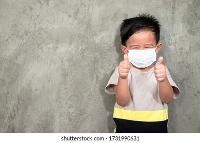 A Boy Wearing Medical Face Mask For Pollution Or Coronavirus,child Itchy Eyes And Nose, Kid Scratching Nose While Wearing Protection Mask.Protection Against Contagious Disease, Coronavirus.