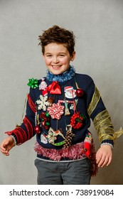 A Boy Wearing An Ugly Homemade Christmas Sweater