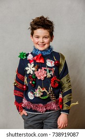 A Boy Wearing An Ugly Homemade Christmas Sweater