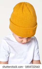 Boy Wearing Yellow Beanie In Studio