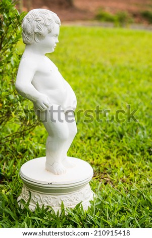 Boy white ceramic statue