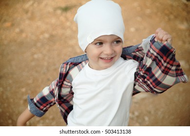 boy in the white hat