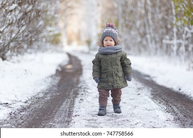 Boy In Winter Forest