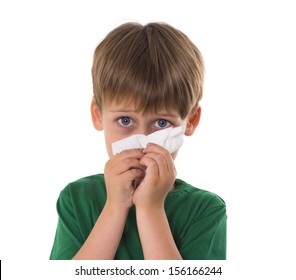 Boy Wipes A Nose A Napkin