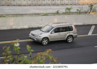 Boyolali Indonesia September 2 2022 Nissan X-Trail Or Nissan Rogue SUV Driving Fast On Trans Jawa Highway Blurry In Motion