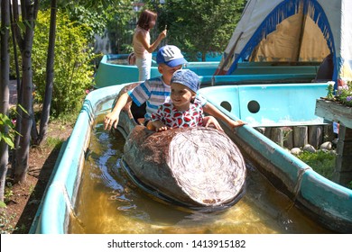 Boys Floats In Lazy River