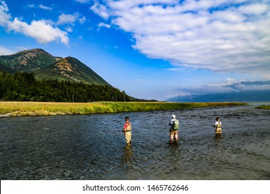 Boys Fly Fishing For Salmon On Resurrection Creek In Hope, Alaska