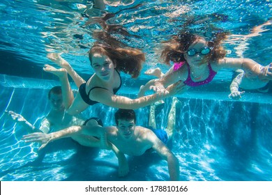 Boys Girls Playtime Swimming Pool Underwater Teen girls boys underwater summer playtime in home swimming pool waters  - Shutterstock ID 178810166