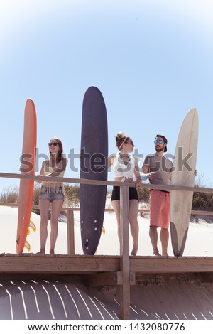 Similar – Beautiful women having fun in a surf class