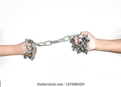 boys hand hold metal chain on white background - Shutterstock ID 1374384329