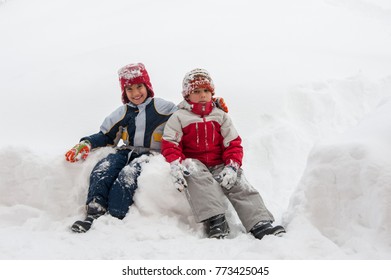 Boys Playing In Really Big Snow