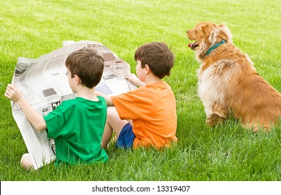 Boys Reading The Newspaper