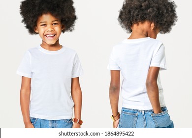 Boy's white t-shirt and jeans in studio