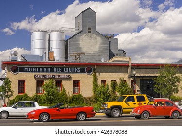 BOZEMAN, MONTANA, USA - AUGUST 2004: Montana Ale Works microbrewery, with grain elevators at rear.