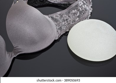 Bra detail and silicone brest implant, Bra and silicone implants