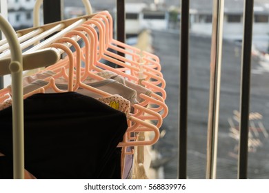 Bra Drying Clothes With Sun At The Balcony Condominium.