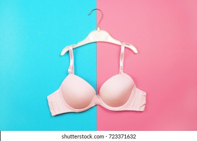  Bra on hanger on two tone background