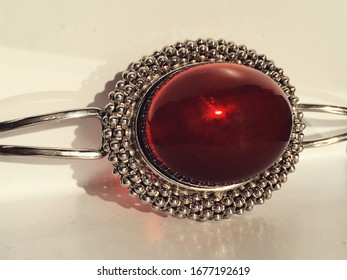 A Bracelet With Large Red Mexican Amber In A Silver Frame. Photo For Decoration Jewelry Store.