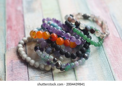 Bracelets From A Natural Stone Agate Amethyst Aventurine Angelite Lava Chrysocolla Carnelian Fluorite Caholong Larimar. Jewelry Photo.