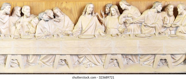 BRADFORD ON AVON - OCT 1: View of a wood carving by an unidentified artist of the Last Supper originally by Leonardo da Vinci in the Saint Thomas Moore Church on Oct 1, 2015 in Bradford on Avon, UK.
