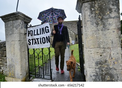 Bradford on Avon, UK - June 8, 2017: A voter leaves a polling station at a village church. Polling stations have opened across the nation as voters decide UK's government in a general election.