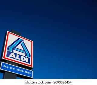 Braga, Portugal, December 14 - 2020: Aldi sign against blue sky. Aldi is a leading global discount supermarket chain with almost 10,000 stores in 18 countries.