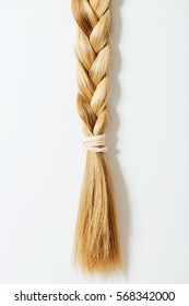 Braid Hairstyle. Blond Long Hair Close Up.