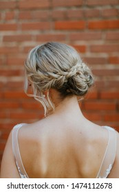 Braided Wedding Hair, Open Back Wedding Dress, Detail Shot, Brick Background 