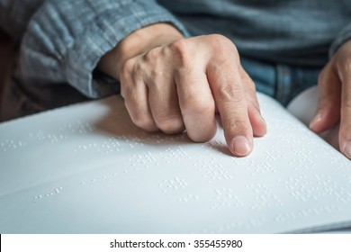 Braille Book With Visual Impaired, Low Vision, Blind Person's Hand/ Finger Touching Paper Texture Reading The Sign