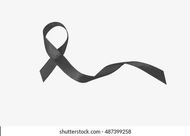 Brain cancer gray ribbon isolated on white background. Satin fabric symbolic concept of the logo awareness, to help support the campaign on the lives of people living W/ neoplastic diseases/ illness .