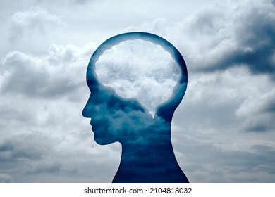 Brain Circuitry And Mind Concept. Person Head Silhouette And Cloudy Sky. 
