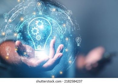 Brain development business ideas, business people show creative ideas to modernize the work processes of the brain with a cog in driving.
