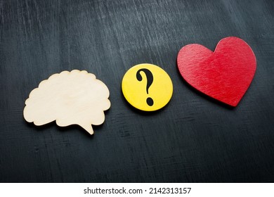 Brain, heart and question mark. Logic or emotions concept. - Shutterstock ID 2142313157