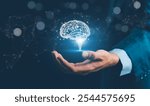 Brain inside the hands of the businessman. Human head and brain.Deep learning , Machine learning and artificial intelligence , AI Technology, thinking concept.The concept of the business idea.