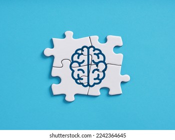 Brain left and right hemispheres connectivity. Human cognition, thinking, problem solving and mental health. Human brain symbol on connected jigsaw puzzle pieces.