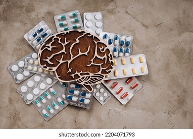 Brain with pills. Awareness of Alzheimer's, Parkinson's disease, dementia. - Shutterstock ID 2204071793