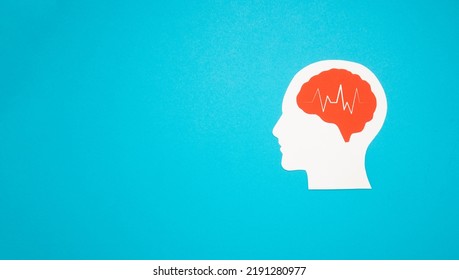 A brain shape made from paper on a light blue background. Awareness of Alzheimer's, Parkinson's, dementia, stroke, seizure, or mental health. Neurology and Psychology care - Shutterstock ID 2191280977