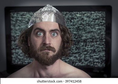 Brain washed crazy man is hypnotized by television program