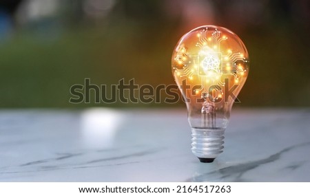 brain working in lightbult in soft green nature background.Idea intelligent in green nature concept