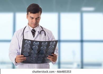 
Brain Xray Film Scan.Doctor Analysis Head Of Patient In Hospital.