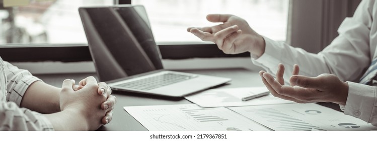 Brainstorm team, Marketers and financial accountants are discussing and analyzing charts to plan strategies to meet customer needs, Business data graph, Team meetings or business consulting. - Shutterstock ID 2179367851