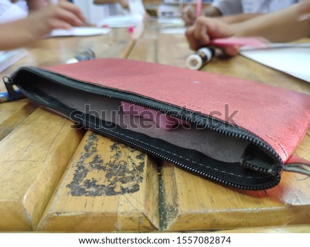 A brainstorming and a pencilcase on the table