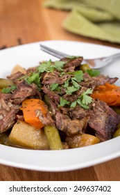 Braised Beef Pot Roast Stew With Vegetables On Table