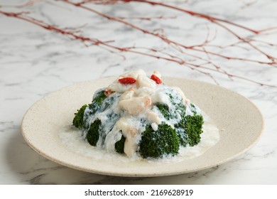 Braised Broccoli With Fresh Crab Meat Served In A Dish Isolated On Grey Background