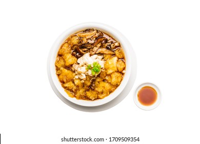 Braised Fish Maw In Brown Gravy Isolated On White Background