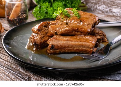 Braised Pork Spare Ribs Served On A Plate.